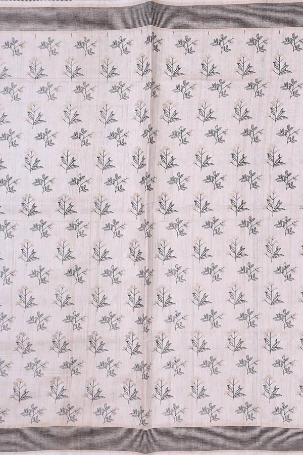 Tussar Silk Saree In Cream Color With Floral Buttas