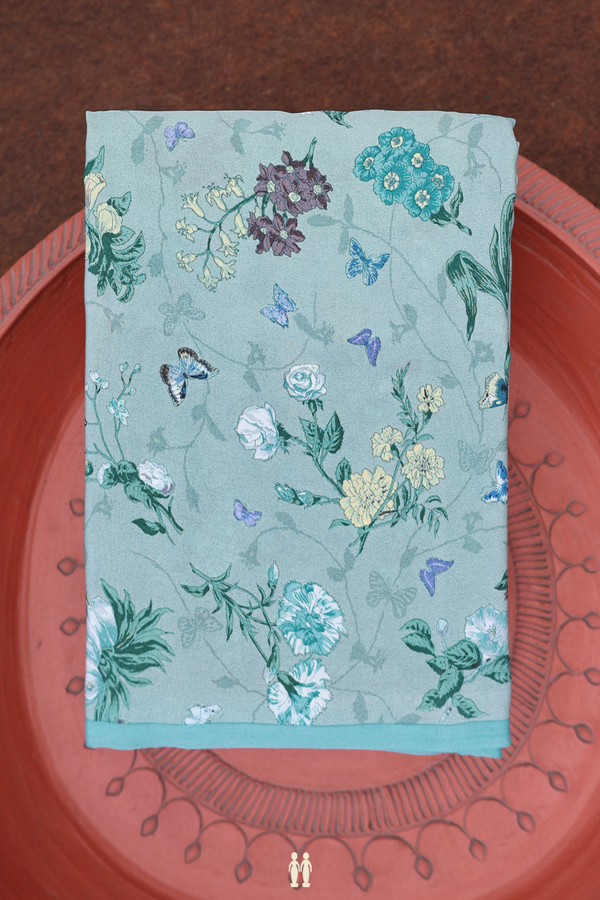 Crepe Saree In Turkish Blue With Floral Printed Design