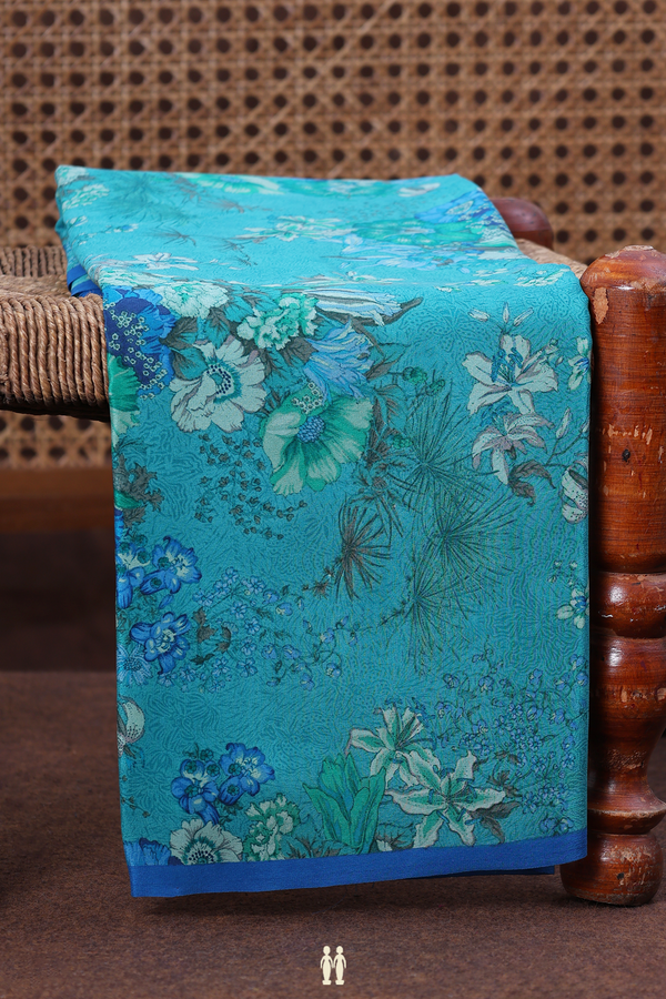 Crepe Saree In Peacock Blue With Floral Design