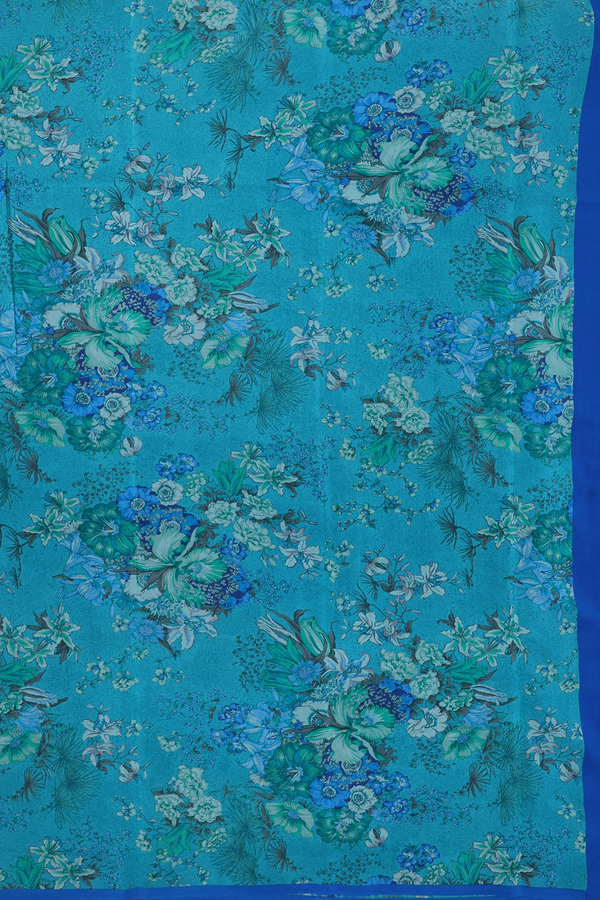 Crepe Saree In Peacock Blue With Floral Design