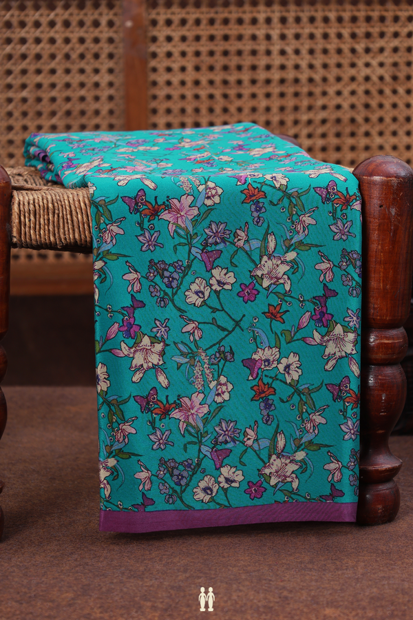Crepe Saree In Peacock Blue With Floral Design