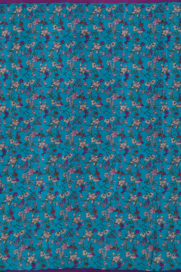 Crepe Saree In Peacock Blue With Floral Design