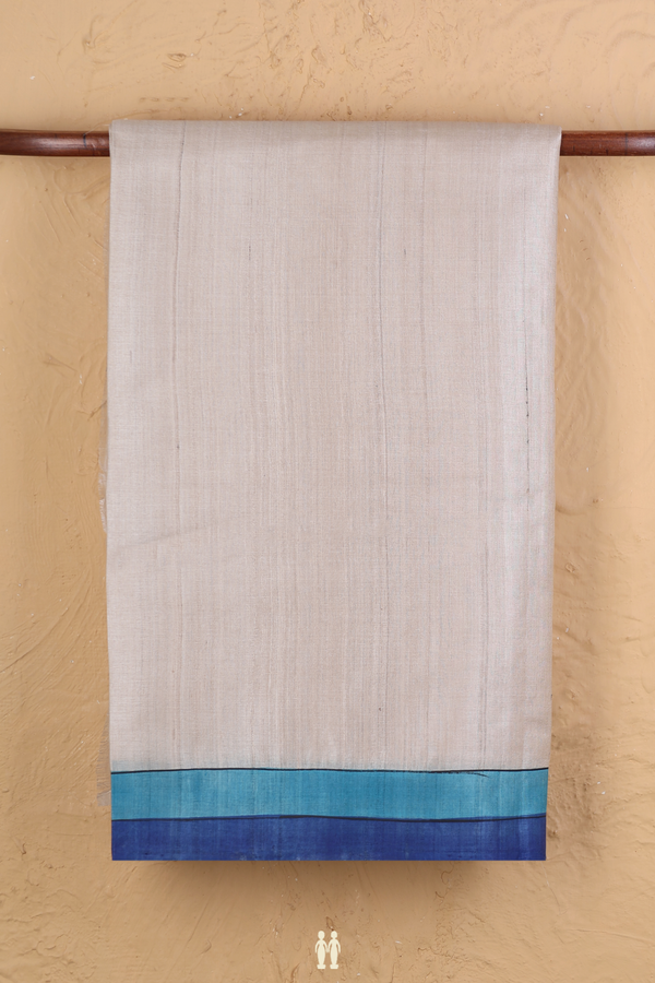 Tussar Silk Saree In Plain Cream Color With Contrast Border