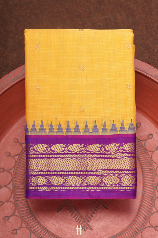 Gadwal Silk Cotton Saree In Yellow With Floral Buttas