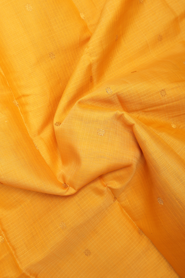 Gadwal Silk Cotton Saree In Yellow With Floral Buttas
