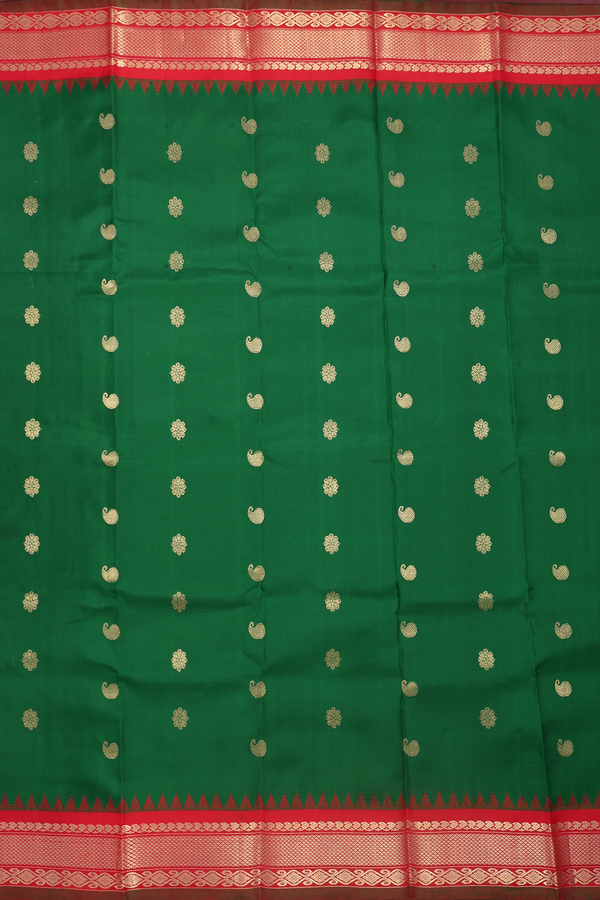 Gadwal Silk Saree In Emerald Green With Floral Buttas