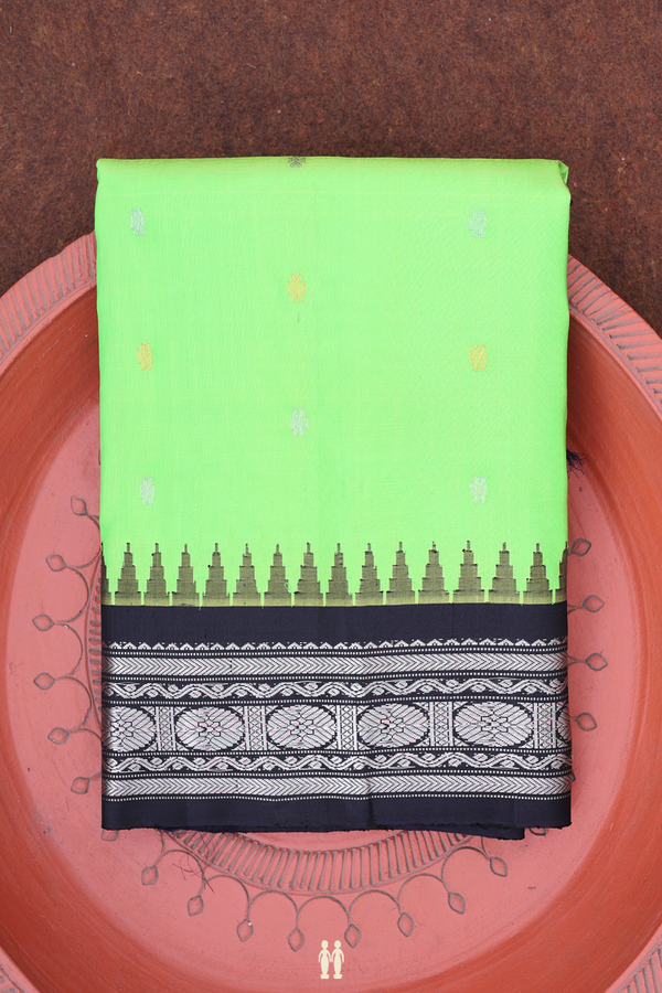 Gadwal Silk Saree In Lime Green With Floral Buttas