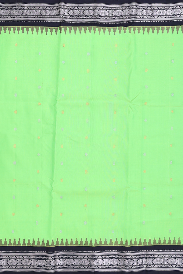 Gadwal Silk Saree In Lime Green With Floral Buttas