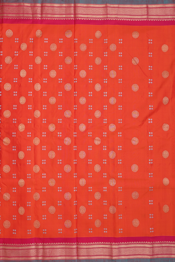 Gadwal Silk Saree In Orange With Chakram Buttas