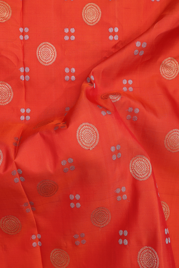 Gadwal Silk Saree In Orange With Chakram Buttas