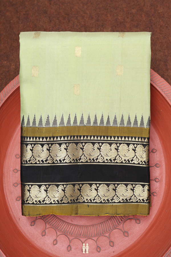 Gadwal Silk Saree In Sage Green With Peacock Buttas