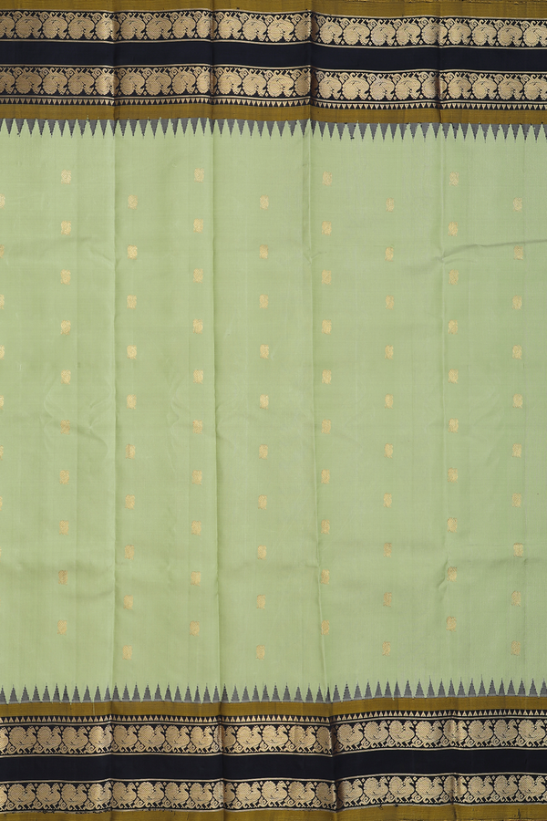 Gadwal Silk Saree In Sage Green With Peacock Buttas