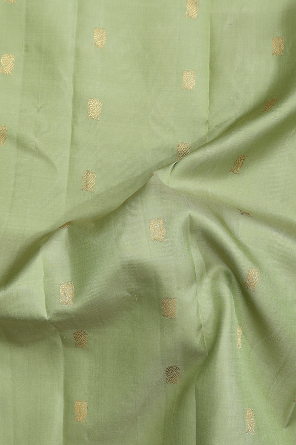Gadwal Silk Saree In Sage Green With Peacock Buttas