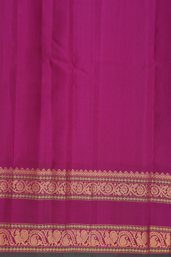 Gadwal Silk Saree In Turquoise Blue With Paisley Buttas
