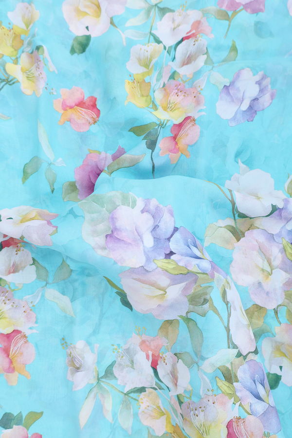 Georgette Saree In Pastel Blue With Floral Printed Design