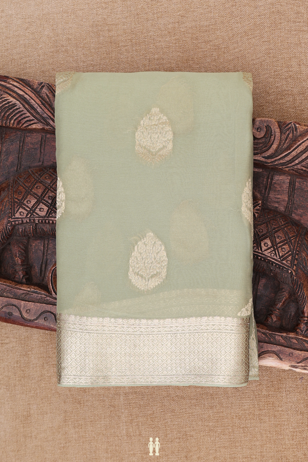 Georgette Saree In Pastel Green With Floral Motifs