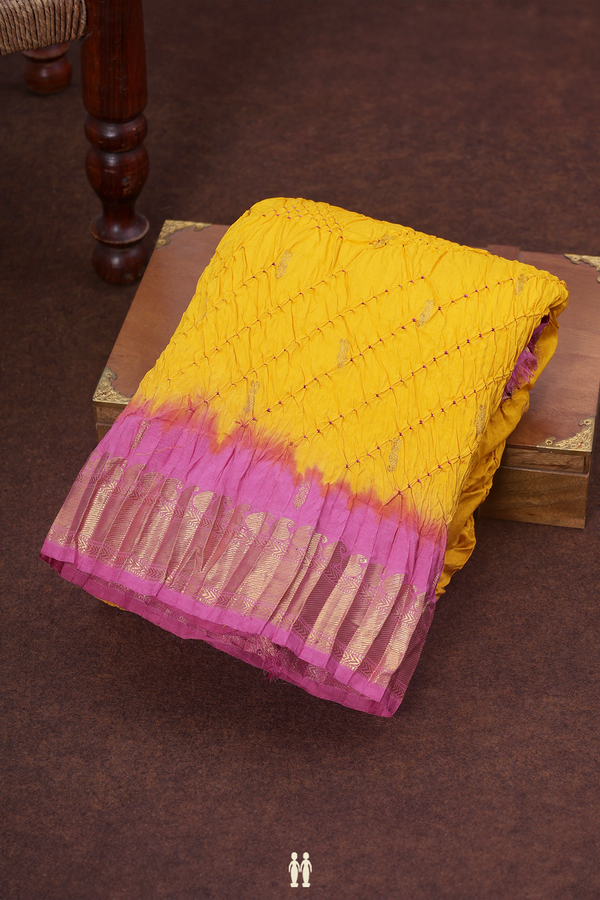Bandhani Silk Saree In Royal Yellow With Zari Buttas