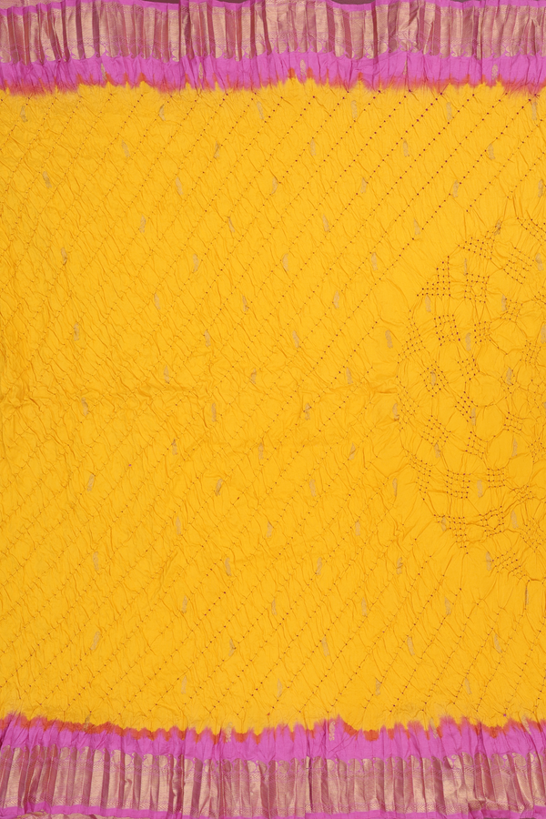 Bandhani Silk Saree In Royal Yellow With Zari Buttas
