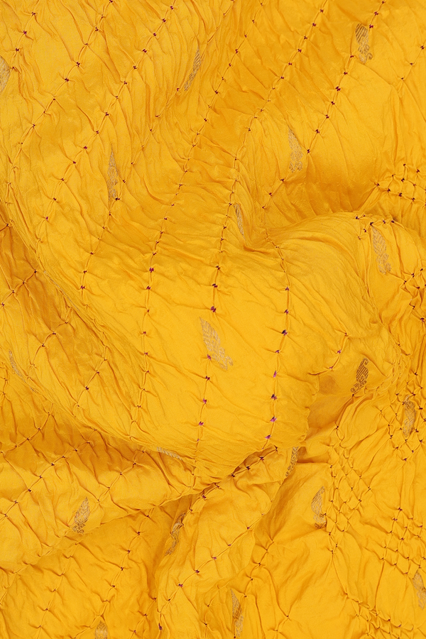 Bandhani Silk Saree In Royal Yellow With Zari Buttas