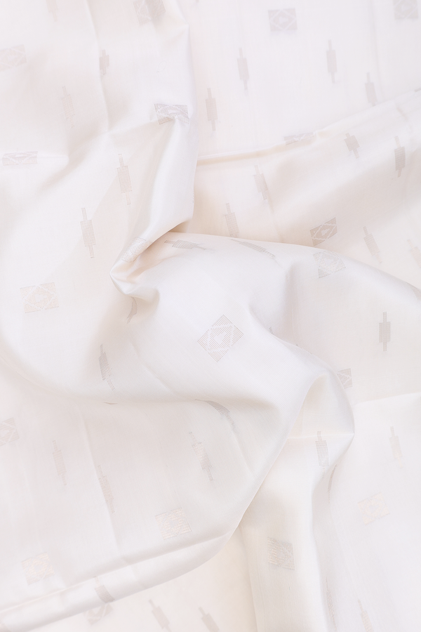 Soft Silk Saree In White With Zari Buttas