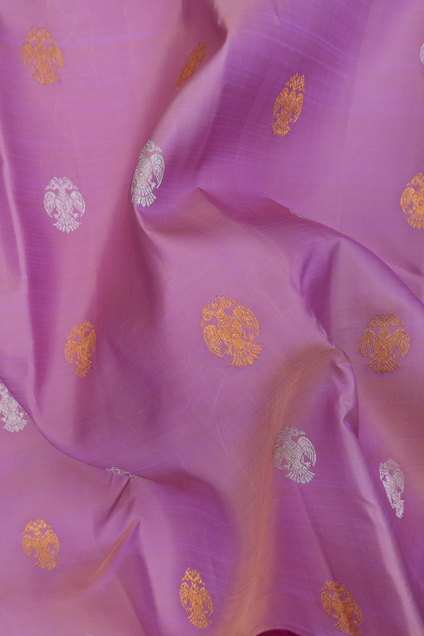 Kanchipuram Silk Saree In Purple With Irruthalai Pakshi Buttas
