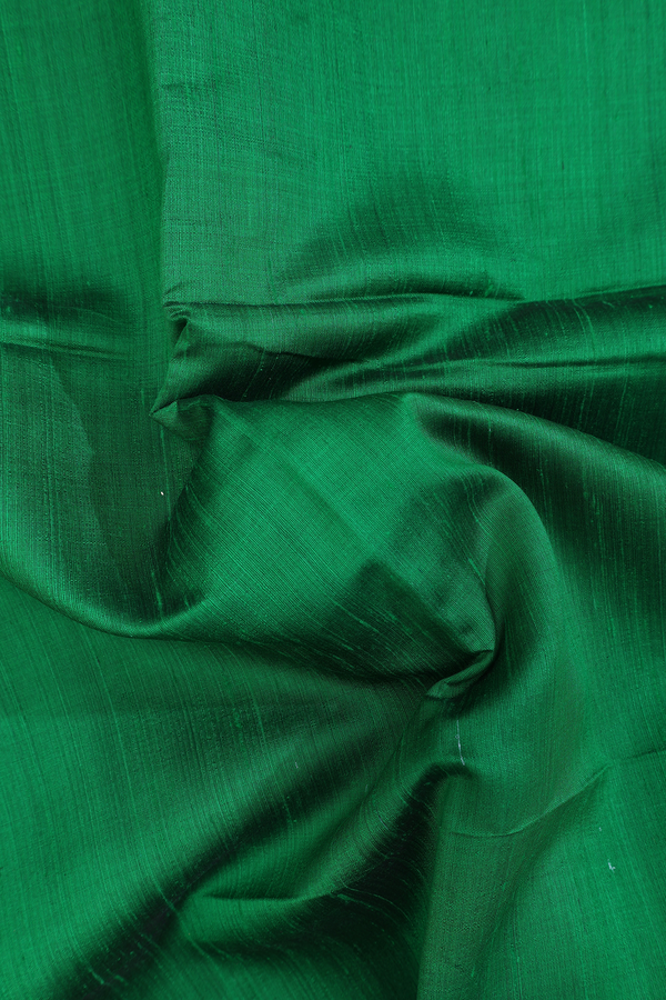 Raw Silk Saree In Plain Emerald Green With Bavanchi Border
