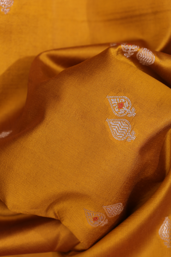 Raw Silk Saree In Golden Yellow With Zari Buttas