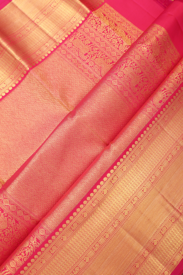 Kanchipuram Silk Saree In Rani Pink With Floral Design