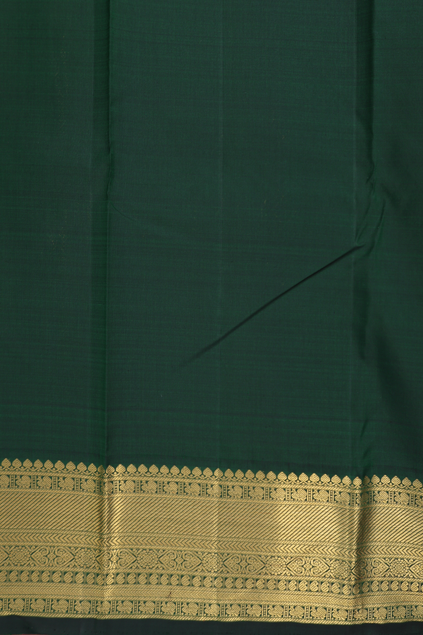 Kanchipuram Silk Saree In Crimson Red With Peacock Buttas