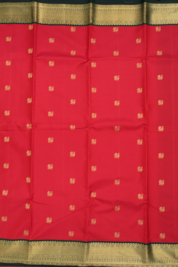 Kanchipuram Silk Saree In Crimson Red With Peacock Buttas