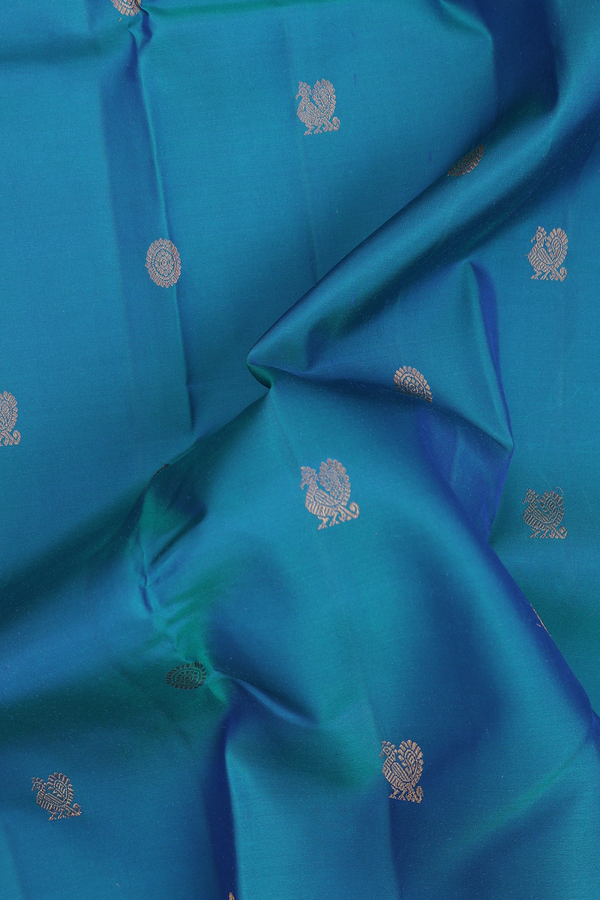 Kanchipuram Silk Saree In Peacock Blue With Peacock Buttas