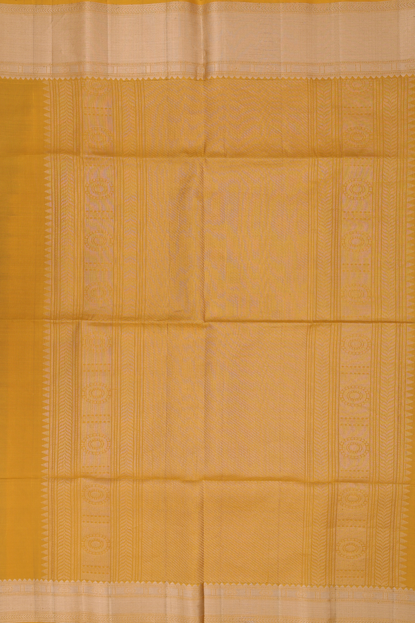 Soft Silk Saree In Yellow With Chakram Buttas