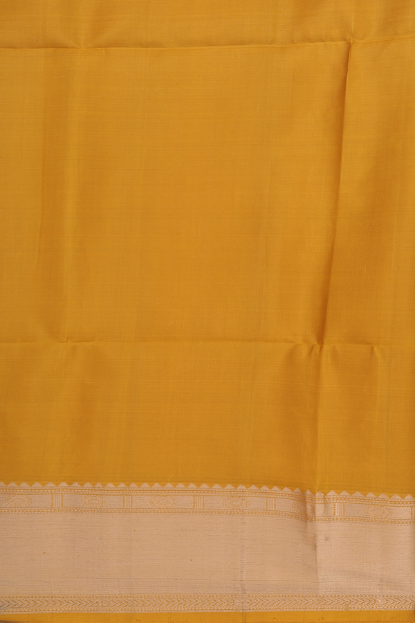 Soft Silk Saree In Yellow With Chakram Buttas
