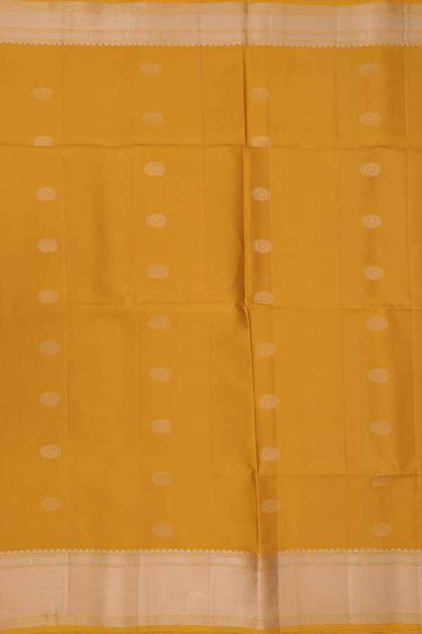 Soft Silk Saree In Yellow With Chakram Buttas