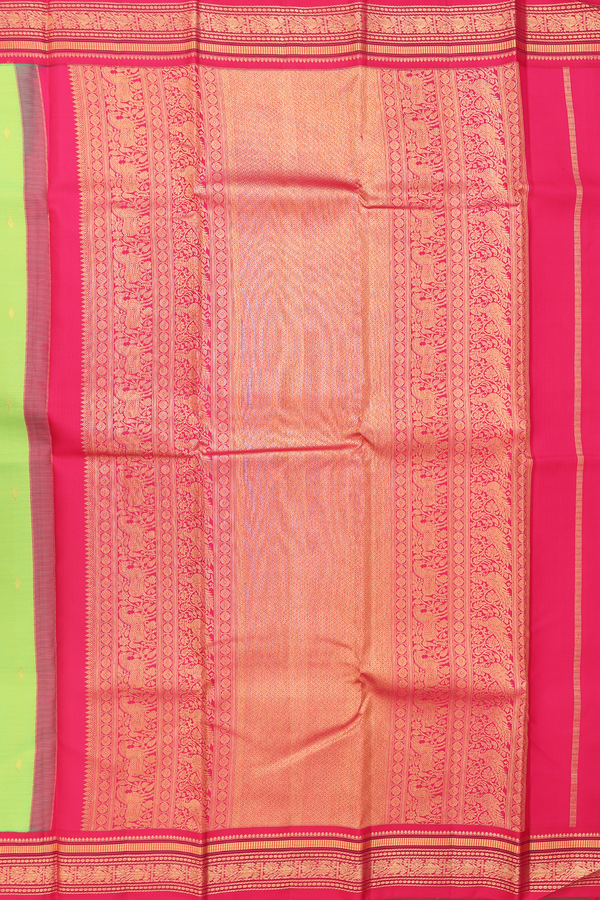 Kanchipuram Silk Saree In Parrot Green With Zari Buttas