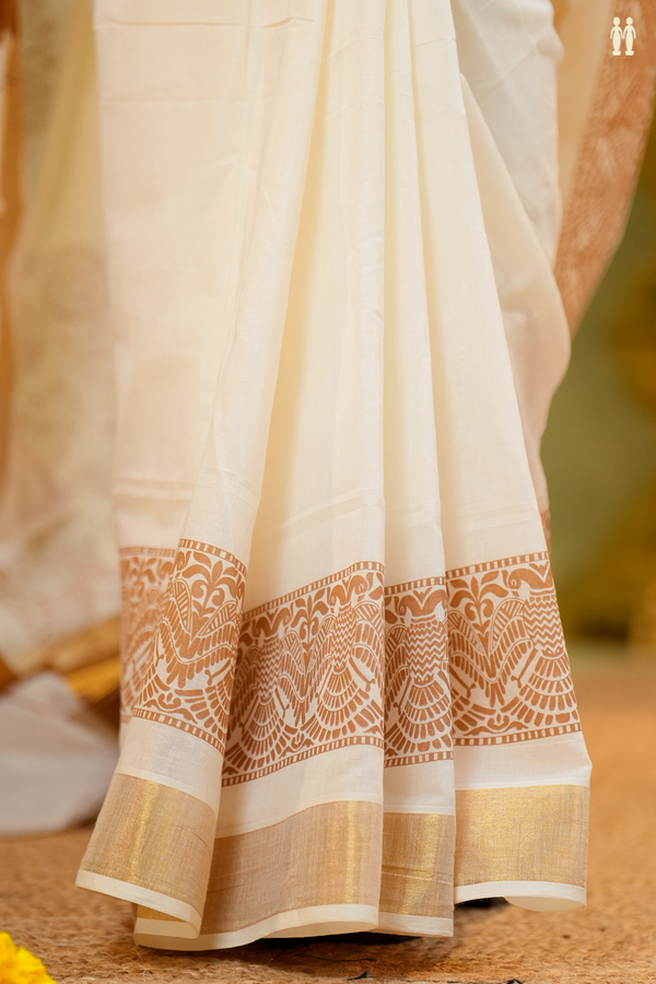 Iruthalai Pakshi Border White Onam Collection