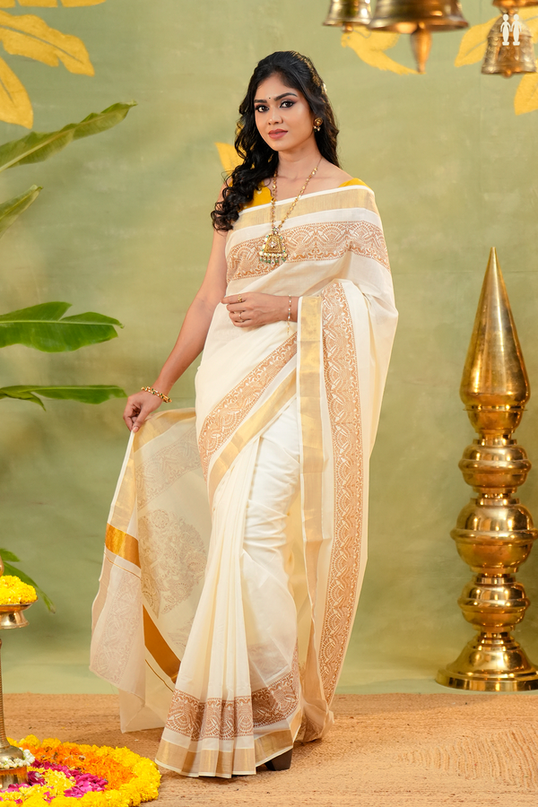 Iruthalai Pakshi Border White Onam Collection