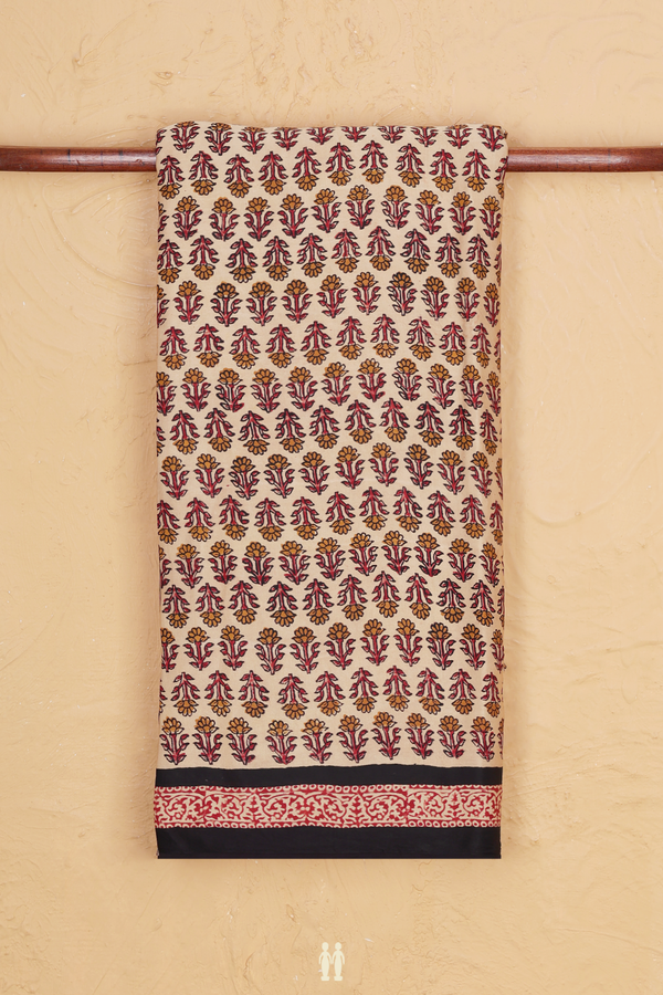Modal Silk Saree In Cream Color With Floral Buttas