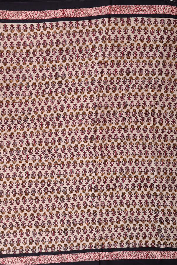 Modal Silk Saree In Cream Color With Floral Buttas