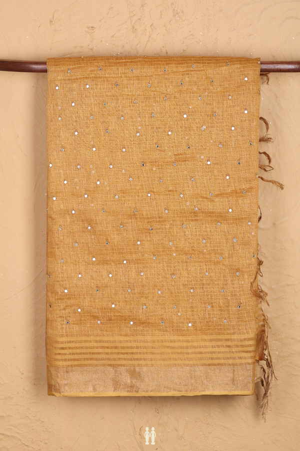 Linen Saree In Mustard With Mirror Work Buttis