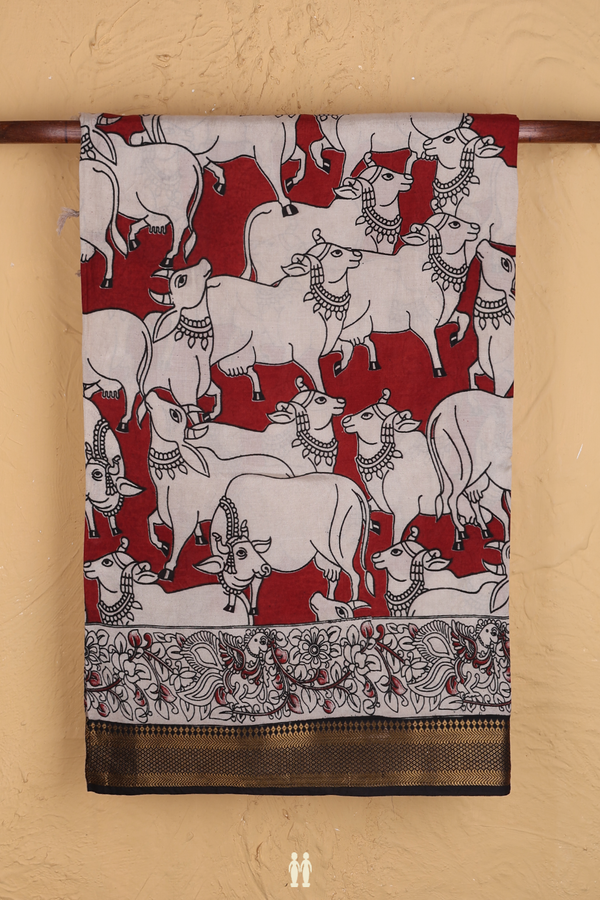 Kalamkari Cotton Saree In Rust Red With Cow Design