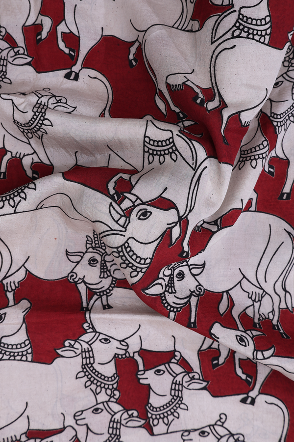 Kalamkari Cotton Saree In Rust Red With Cow Design