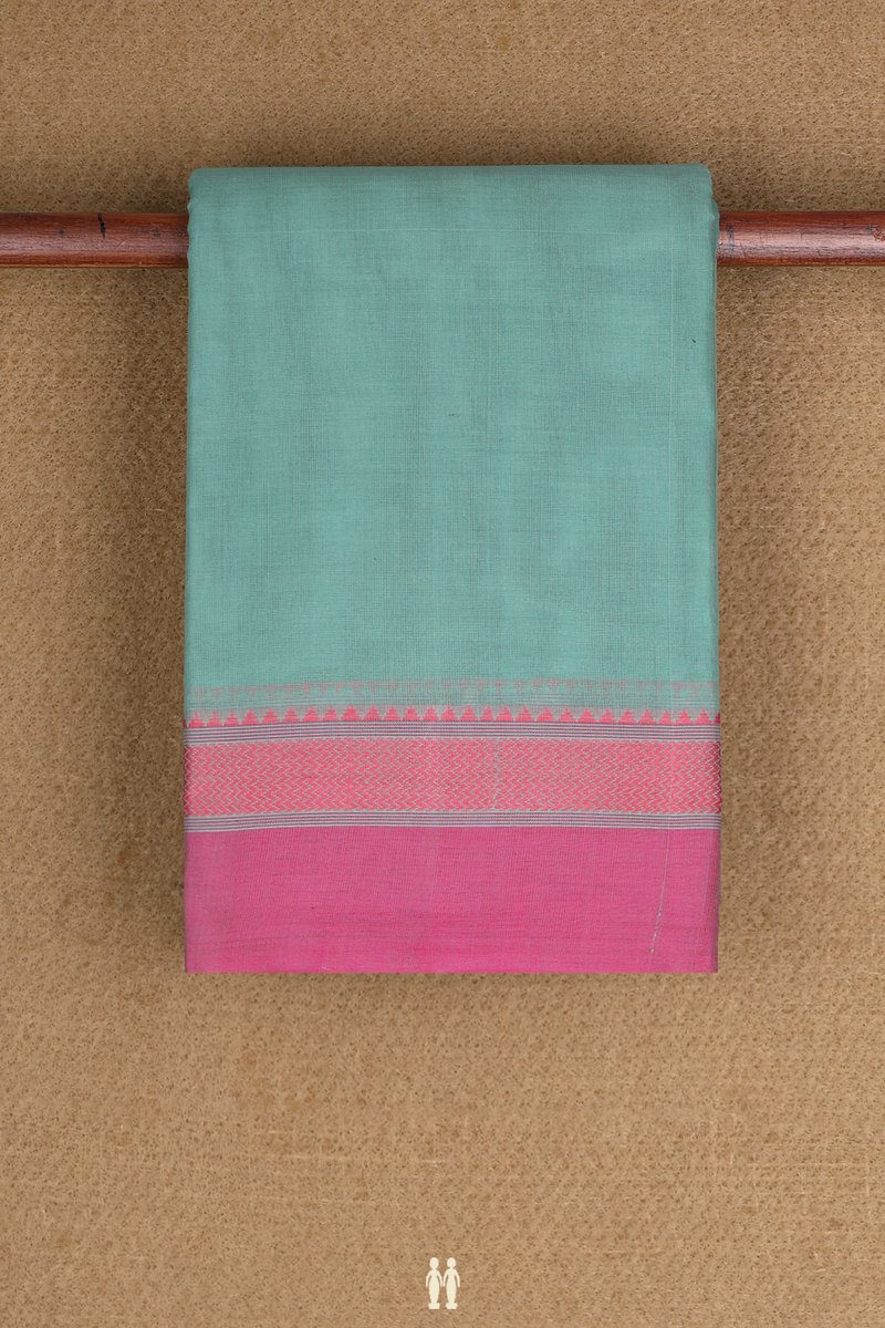 Kanchi Cotton Saree In Dusty Green With Contrast Border