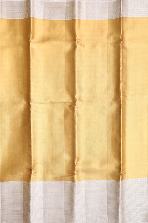 Kanchipuram Silk Saree In Gold Tissue With Contrast Border