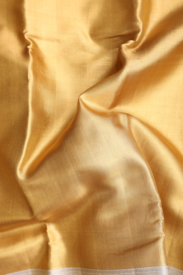 Kanchipuram Silk Saree In Gold Tissue With Contrast Border