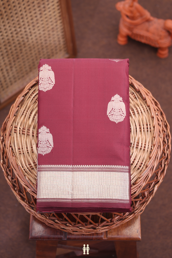 Kanchipuram Silk Saree In Brown With Iruthalai Pakshi Buttas