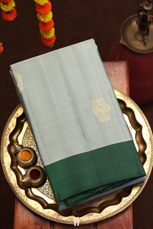 Kanchipuram Silk In Greenish Grey With Iruthalai Pakshi Buttas