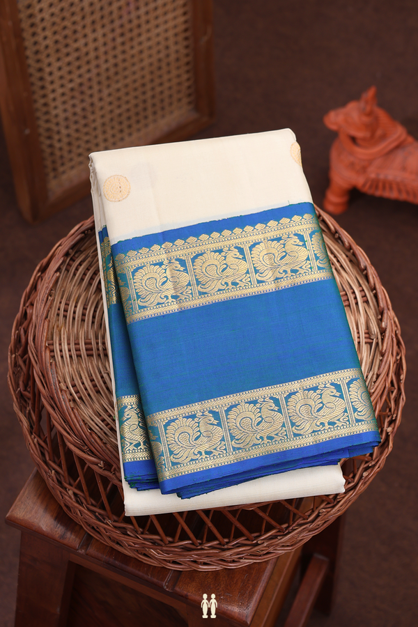 Kanchipuram Silk Saree In Beige With Iruthalai Pakshi Buttas