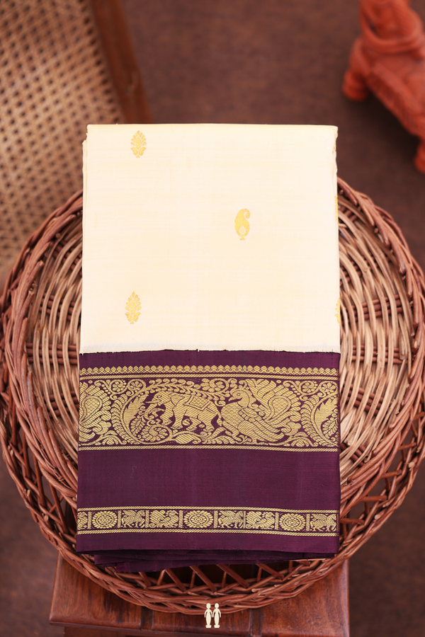 Kanchipuram Silk Saree In Beige With Paisley Buttas