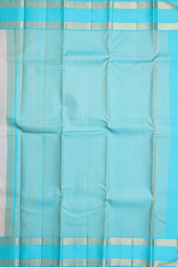 Kanchipuram Silk Saree In Cream With Paisley Buttas